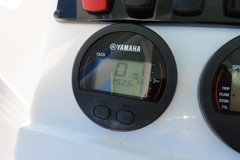 Slide: The Image of Yamaha tachometer on 2023 Sea Hunt Ultra 234 boat dashboard, displaying 192.6 hours. - 25