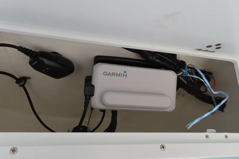 Slide: The Image of Garmin device installed in 2023 Sea Hunt Ultra 234 boat compartment. - 28