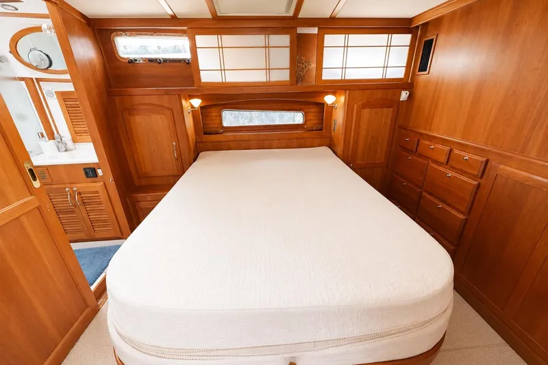 Slide: The Image of Luxurious wood-finished bedroom in 2013 Sabre 48 Salon Express yacht. - 12
