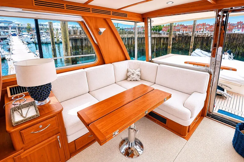 Slide: The Image of Luxurious interior of 2013 Sabre 48 Salon Express yacht with elegant seating and wooden accents. - 2