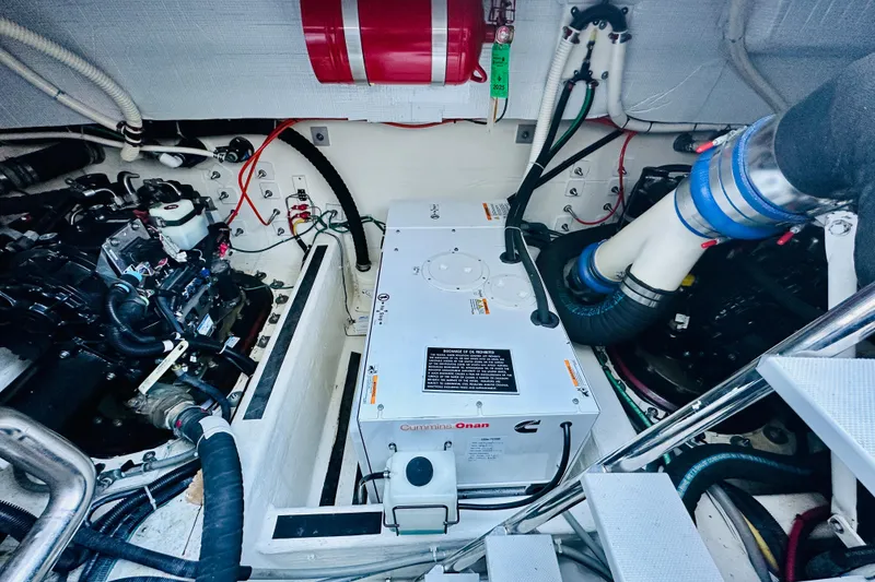 Slide: The Image of Engine room of a 2013 Sabre 48 Salon Express with Cummins Onan generator. - 20