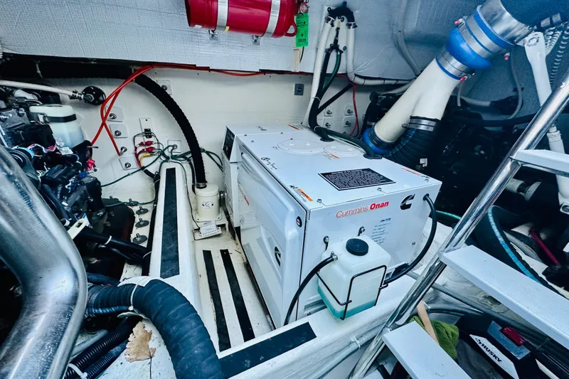 Slide: The Image of Engine room of 2013 Sabre 48 Salon Express with Cummins Onan generator. - 22