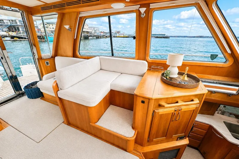 Slide: The Image of Interior of 2013 Sabre 48 Salon Express yacht with cozy seating and ocean view. - 3