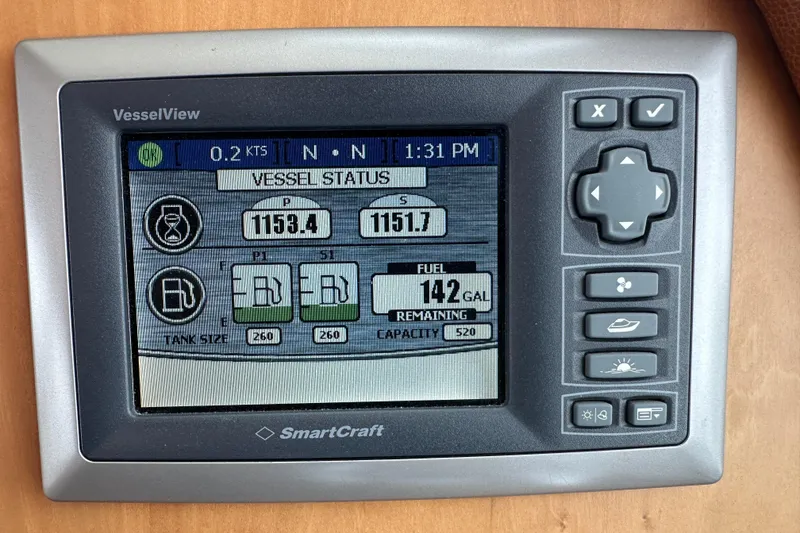 Slide: The Image of SmartCraft VesselView display on 2013 Sabre 48 Salon Express showing vessel status and fuel levels. - 9
