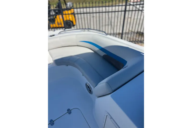 Slide: The Image of 2021 Hurricane SunDeck Sport 188 OB boat interior with blue and white seating. - 10