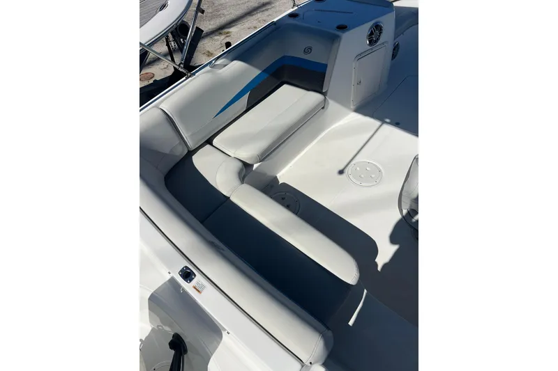 Slide: The Image of 2021 Hurricane SunDeck Sport 188 OB boat interior with cushioned seating. - 14