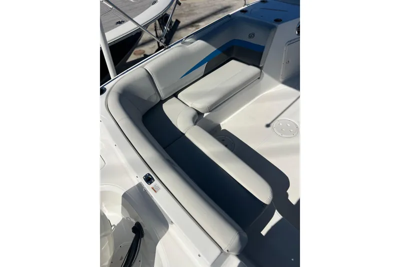 Slide: The Image of 2021 Hurricane SunDeck Sport 188 OB boat interior with cushioned seating. - 18