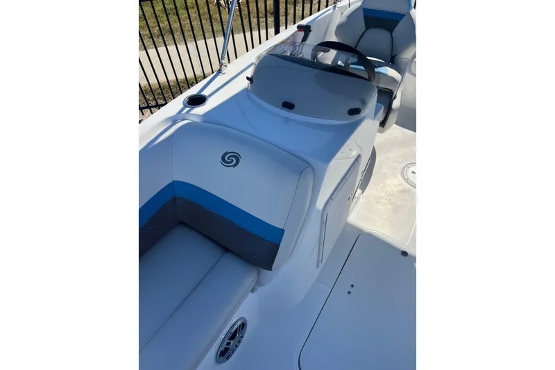 Slide: The Image of 2021 Hurricane SunDeck Sport 188 OB boat interior with seating and steering console. - 6