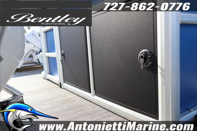 Slide: The Image of 2026 Bentley Pontoons 243 Fish-N-Cruise boat interior with storage compartments. - 10