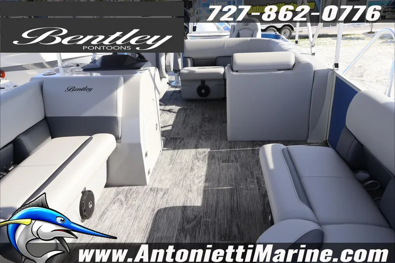 Slide: The Image of 2026 Bentley Pontoons 243 Fish-N-Cruise interior with gray seating, displayed by Antonietti Marine. - 14