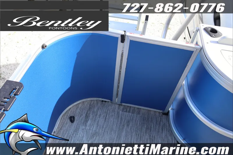 Slide: The Image of 2026 Bentley Pontoons 243 Fish-N-Cruise interior with blue panels and flooring. - 30