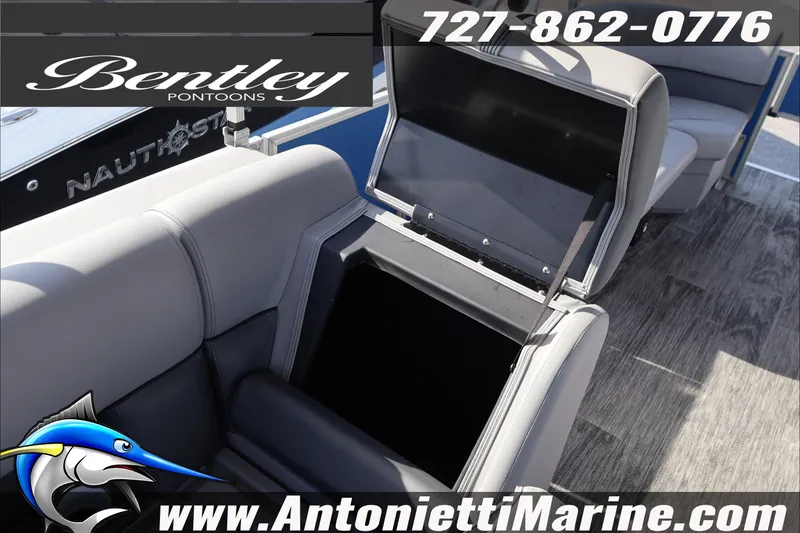 Slide: The Image of 2026 Bentley Pontoons 243 Fish-N-Cruise interior storage compartment, gray seating, Antonietti Marine. - 38
