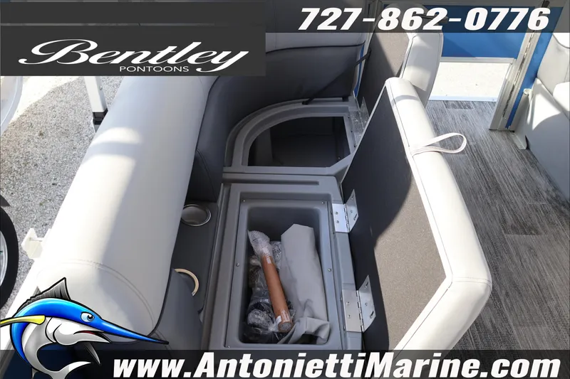 Slide: The Image of 2026 Bentley Pontoons 243 Fish-N-Cruise interior seating with storage compartments. - 40
