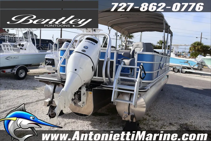 Slide: The Image of 2026 Bentley Pontoons 243 Fish-N-Cruise boat displayed at Antonietti Marine dealership. - 6