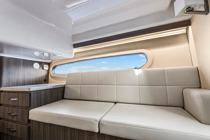 Slide: The Image of Luxurious interior of 2020 Regal 38 XO yacht with modern seating and cabinetry. - 37