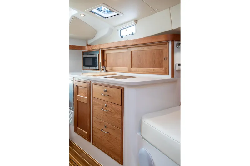Slide: The Image of Interior of 2025 MJM 35 yacht with wooden cabinetry. - 4