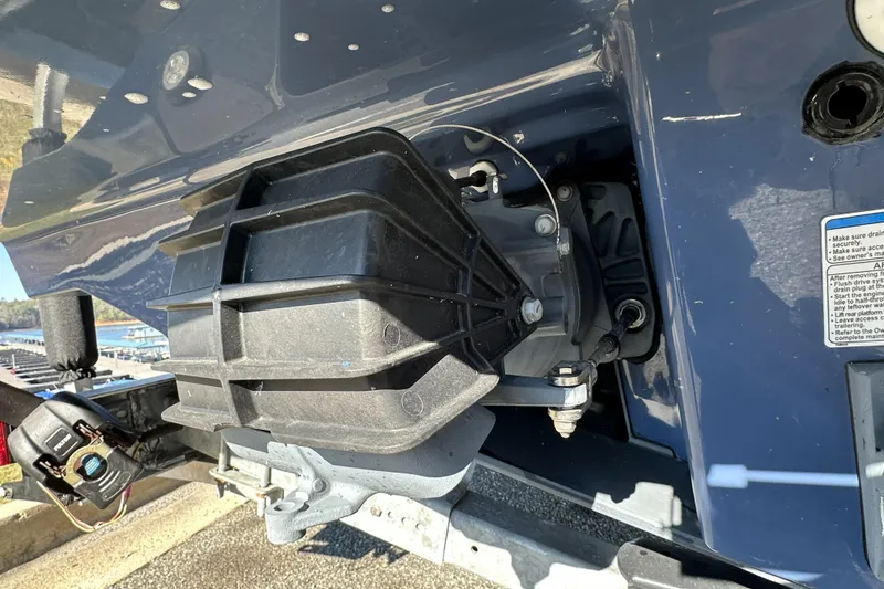 Slide: The Image of Close-up of 2023 Yamaha Boats 252 FSH Sport engine component, showcasing intricate details. - 12