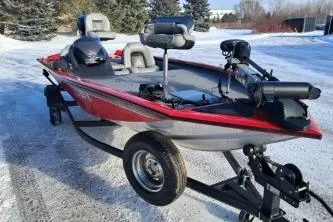 Slide: The Image of 2018 Tracker Pro Team 175 TXW fishing boat on snowy ground. - 6