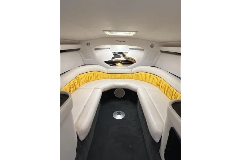 Slide: The Image of Interior of 2002 Donzi 38 Daytona boat with white and yellow seating. - 17