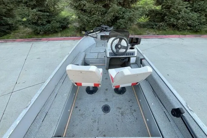 Slide: The Image of 2008 Tracker Super Guide V-14 SC boat interior with dual seats and steering console. - 14