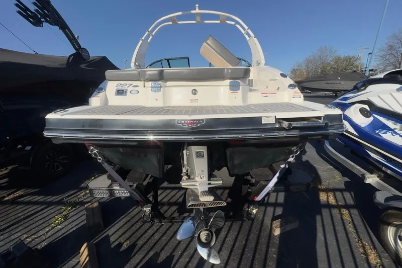Slide: The Image of 2016 Chaparral 227 SSX boat rear view with swim platform and propeller. - 4