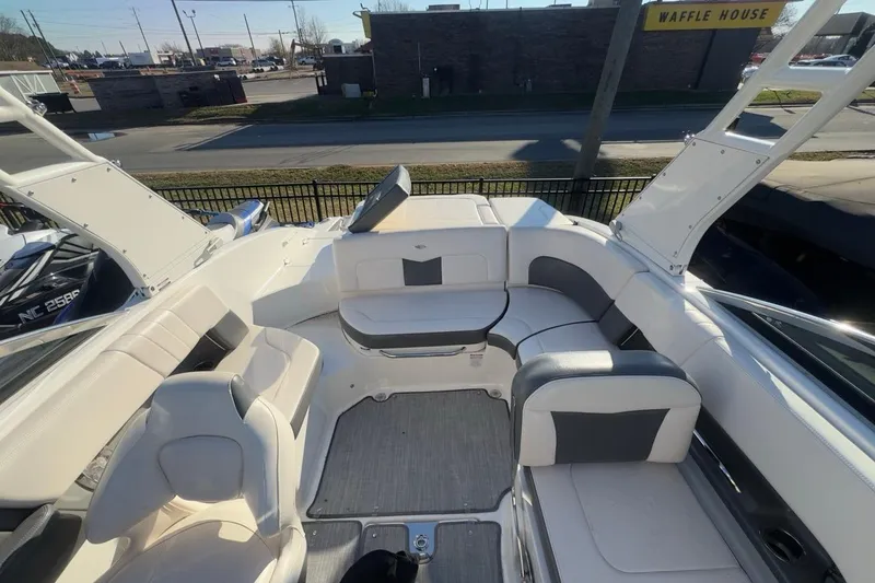 Slide: The Image of 2016 Chaparral 227 SSX boat interior with spacious seating and modern design. - 6