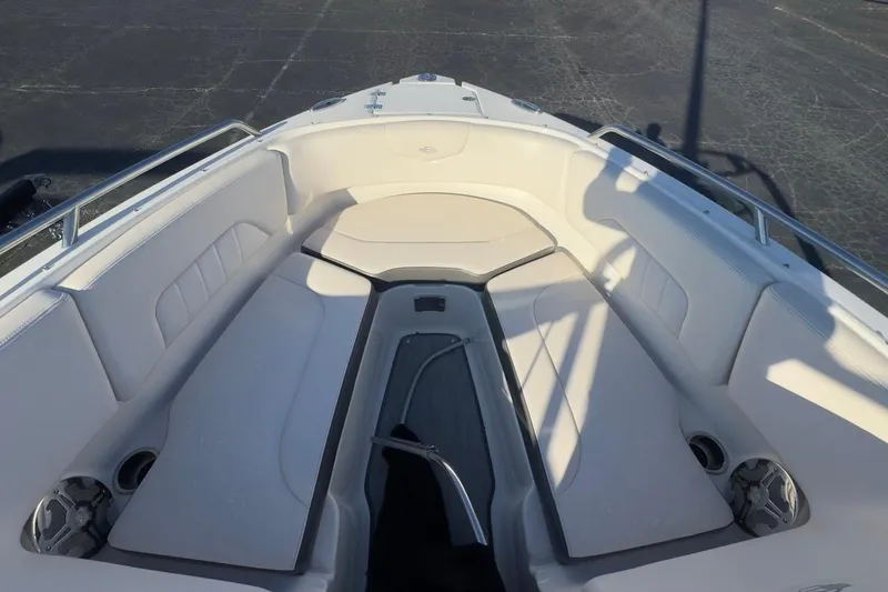 Slide: The Image of 2016 Chaparral 227 SSX boat interior with spacious seating and cup holders. - 8