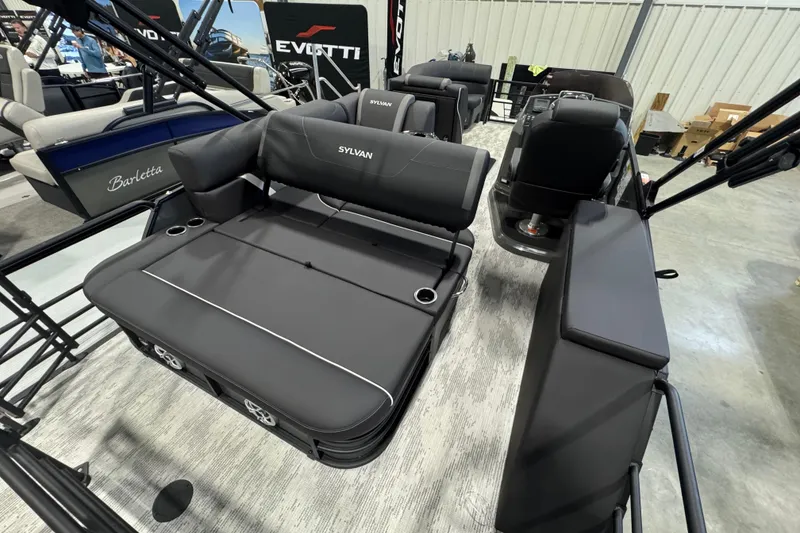 Slide: The Image of 2026 Sylvan Mirage X X3 CLZ pontoon boat interior with sleek seating and modern design. - 11