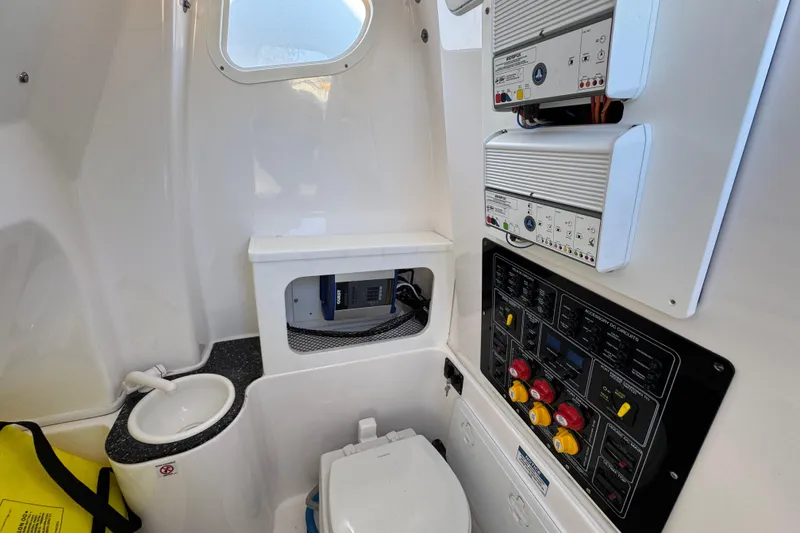 Slide: The Image of Interior of 2022 Sea Fox 288 Commander boat with control panels and compact sink. - 26