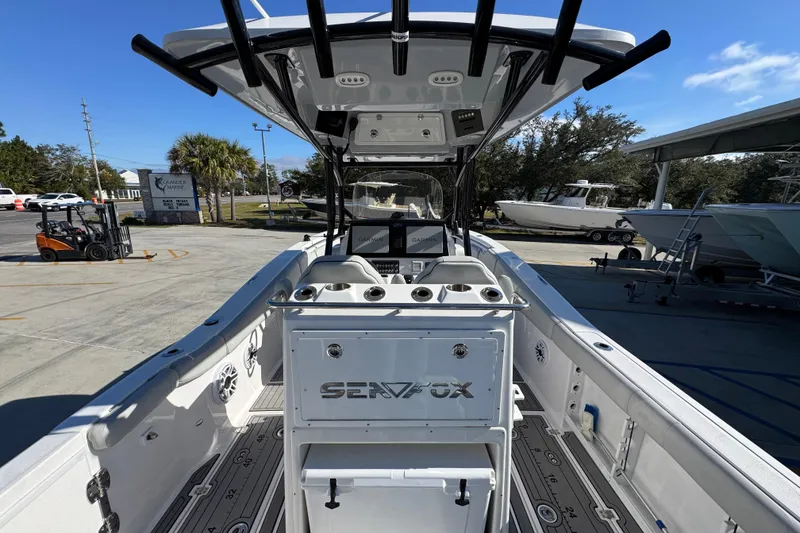 Slide: The Image of 2022 Sea Fox 288 Commander boat interior with modern console and rod holders. - 38