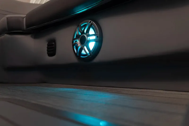 Slide: The Image of Illuminated speaker detail on 2026 SunCatcher Fusion 322SS boat interior. - 5