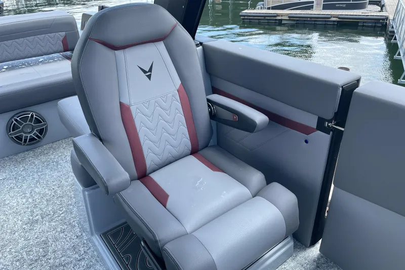 Slide: The Image of Luxurious seating on 2025 Revel RS25L boat, featuring modern design and comfortable upholstery. - 8