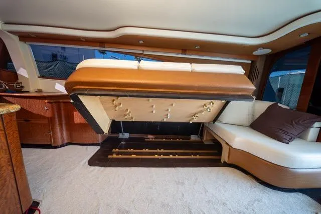 Slide: The Image of Luxurious 1997 Garlington Convertible yacht interior with hidden storage under seating. - 46