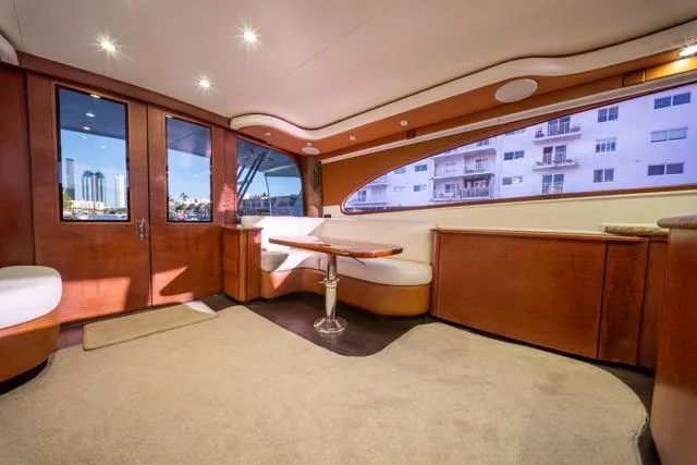Slide: The Image of Luxurious 1997 Garlington Convertible yacht interior with elegant wood finishes and plush seating. - 47