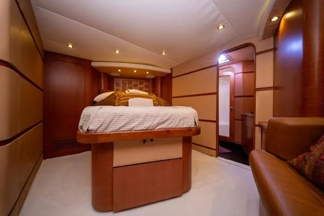 Slide: The Image of Luxurious interior of a 1997 Garlington Convertible yacht with elegant wood finishes. - 5