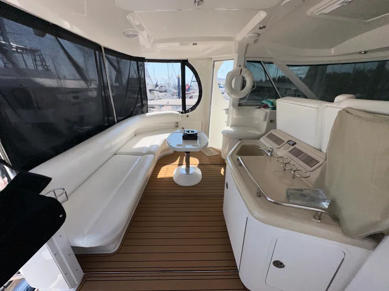 Slide: The Image of Luxurious 2007 Sea Ray 40 Motor Yacht interior with elegant seating and modern amenities. - 13