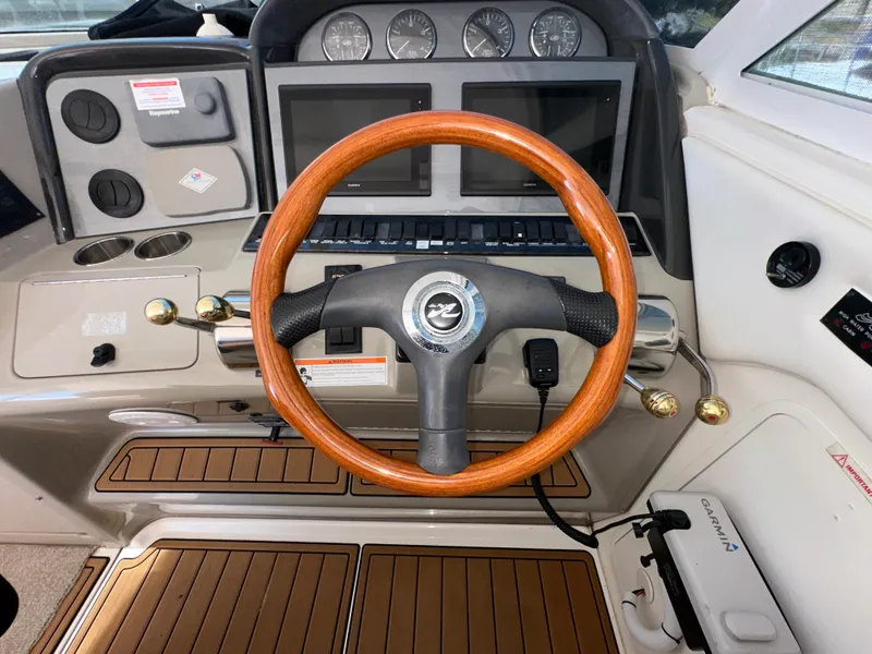 Slide: The Image of Luxurious 2007 Sea Ray 40 Motor Yacht interior with elegant seating and modern amenities. - 27