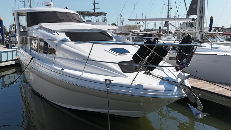 Slide: The Image of 2007 Sea Ray 40 Motor Yacht docked at marina, front view. - 3
