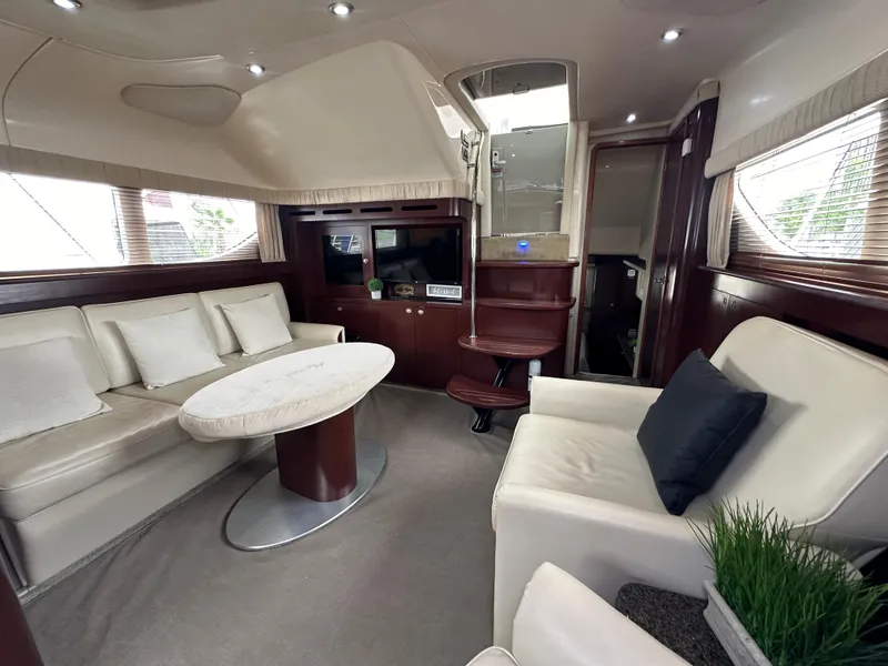 Slide: The Image of Luxurious 2007 Sea Ray 40 Motor Yacht kitchen with wood cabinetry and modern appliances. - 32