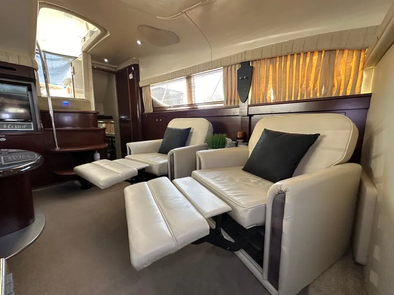 Slide: The Image of Luxurious 2007 Sea Ray 40 Motor Yacht interior with cozy seating and elegant design. - 34