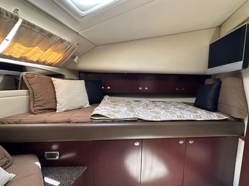 Slide: The Image of Luxurious bedroom interior of 2007 Sea Ray 40 Motor Yacht with elegant decor. - 42
