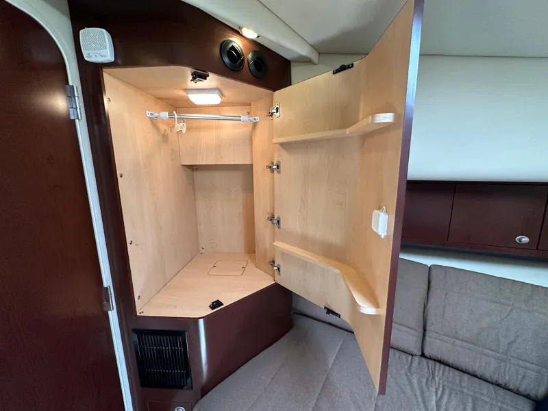 Slide: The Image of Luxurious bedroom interior of 2007 Sea Ray 40 Motor Yacht with elegant bedding. - 43