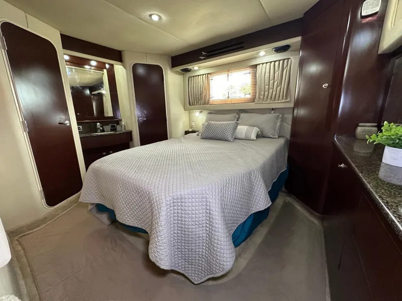 Slide: The Image of Interior of a 2007 Sea Ray 40 Motor Yacht with cozy bedroom. - 46