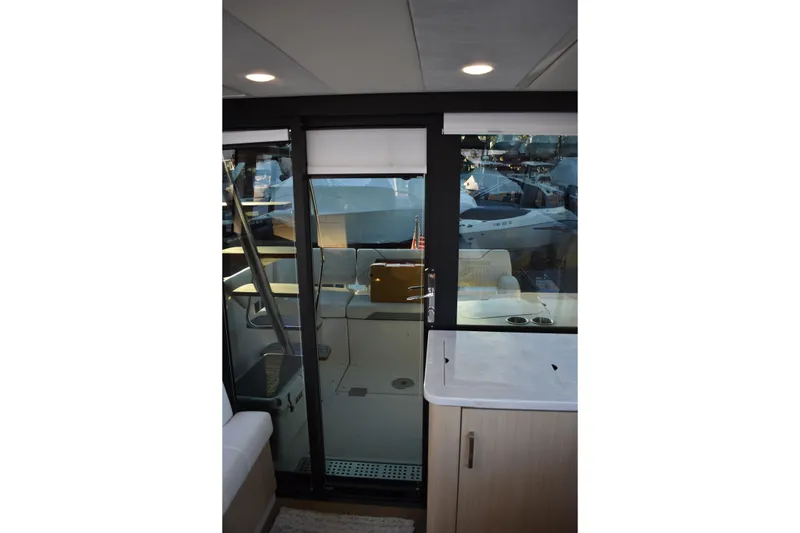 Slide: The Image of Interior view of 2025 Regal 38 FXO yacht, featuring sleek design and modern amenities. - 27