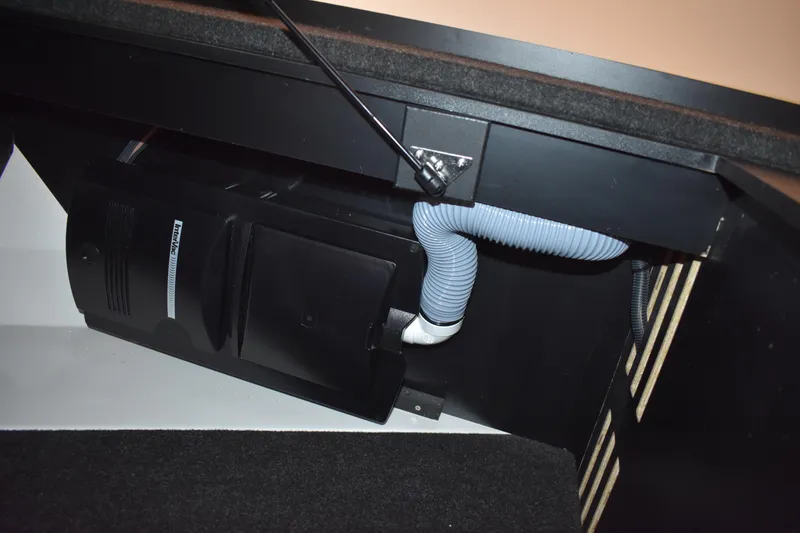 Slide: The Image of Under-desk view of 2025 Regal 38 FXO boat with ventilation system and wiring. - 44