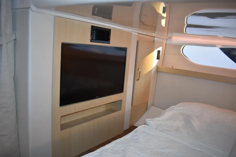 Slide: The Image of Interior of 2025 Regal 38 FXO yacht with TV and modern design. - 50