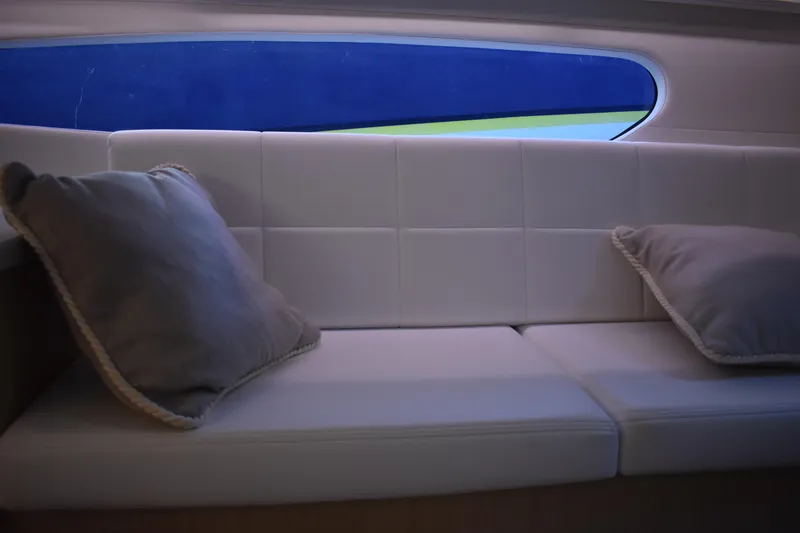 Slide: The Image of Luxurious interior seating of 2025 Regal 38 FXO yacht with plush cushions. - 52