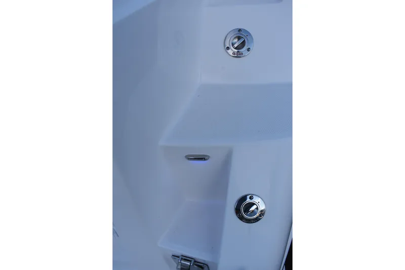 Slide: The Image of Close-up of 2025 Regal 38 FXO boat deck with fuel and water inlets. - 72