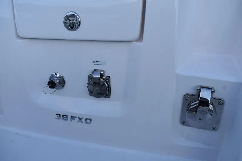 Slide: The Image of 2025 Regal 38 FXO boat fittings and hardware details. - 73