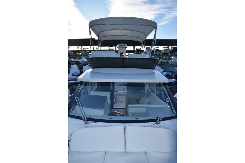 Slide: The Image of 2025 Regal 38 FXO yacht with spacious deck and modern design. - 83